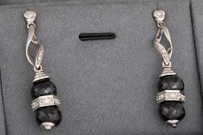 Lot 52 - A PAIR OF ONYX AND DIAMOND DROP EARRINGS,...