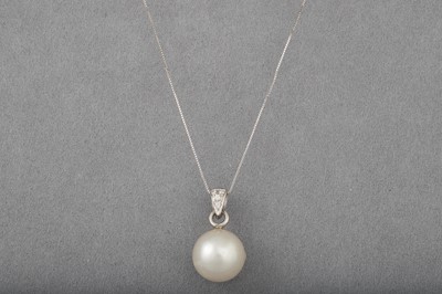 Lot 54 - A PEARL AND DIAMOND PENDANT, the pearl pendant...