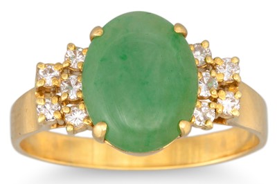 Lot 304 - A JADE AND DIAMOND RING, the cabochon jade to...