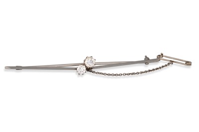 Lot 337 - AN ANTIQUE TWO STONE DIAMOND BAR BROOCH, in...