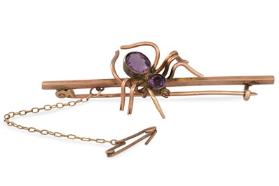 Lot 98 - AN ANTIQUE NOVELTY BROOCH, with an amethyst...