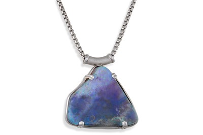 Lot 61 - A LARGE FLAT OPAL PENDANT, of naturalistic...