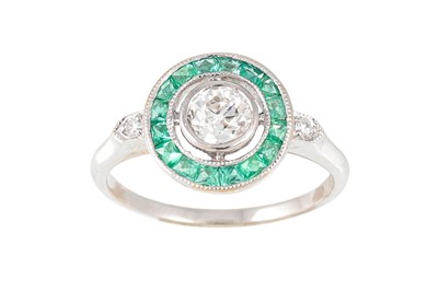 Lot 86 - A DIAMOND AND EMERALD TARGET RING, the old cut...