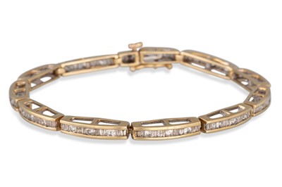 Lot 111 - A DIAMOND BRACELET, channel set in 10ct...