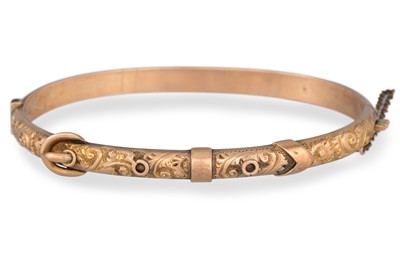 Lot 95 - A 9CT YELLOW GOLD HINGED BANGLE, part embossed...