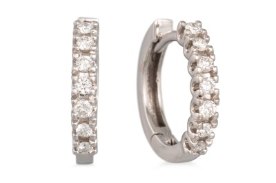 Lot 192 - A PAIR OF DIAMOND EARRINGS, huggie hoop style,...