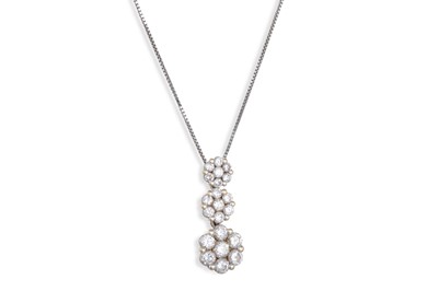 Lot 201 - A DIAMOND CLUSTER PENDANT, the three diamond...