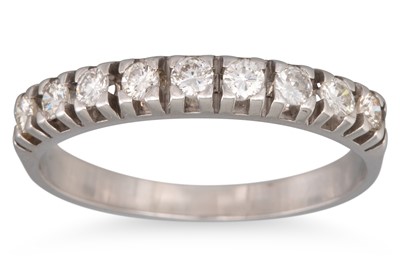 Lot 152 - A DIAMOND HALF ETERNITY RING, the round...