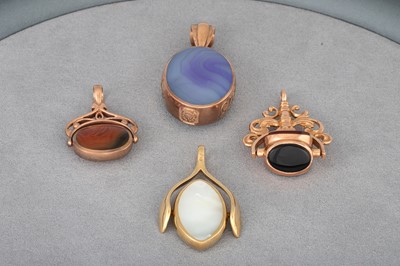 Lot 227 - A COLLECTION OF FOUR 9CT GOLD FRAMED FOBS,...