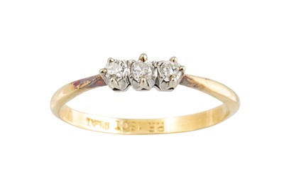 Lot 147 - A THREE STONE DIAMOND RING, mounted in 18ct...