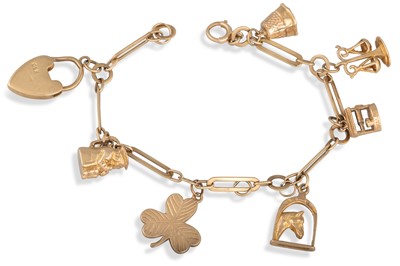 Lot 9 - A 9CT GOLD CHARM BRACELET, padlock clasp, 18.1 g.