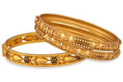 Lot 22 - THREE 22CT GOLD BANGLES, Eastern style, 39.2 g.