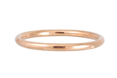 Lot 150 - A 9CT YELLOW GOLD HOLLOW BANGLE, 11",...