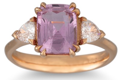 Lot 360 - A PINK SAPPHIRE AND DIAMOND RING, the cushion...