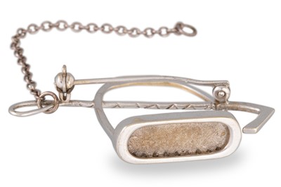 Lot 143 - AN ANTIQUE 14CT GOLD AND DIAMOND EQUESTRIAN...