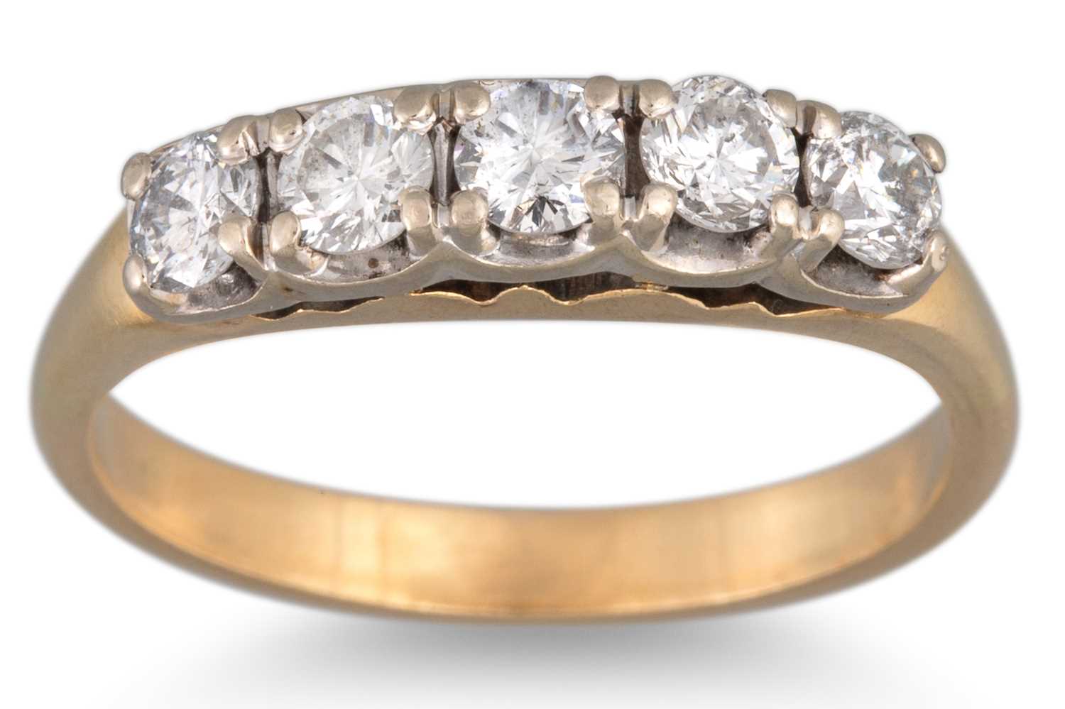 Lot 19 - A FIVE STONE DIAMOND RING, the brilliant cut...