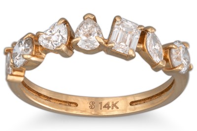 Lot 143 - A DIAMOND HALF ETERNITY RING, set with...