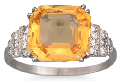 Lot 144 - A TOPAZ AND DIAMOND RING, the rectangular...