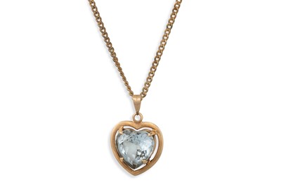 Lot 233 - AN AQUAMARINE HEART SHAPED PENDANT, mounted in...