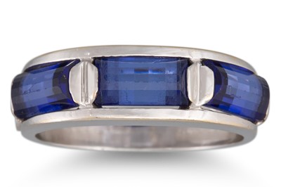 Lot 36 - A THREE STONE IOLITE RING, mounted in 18ct...