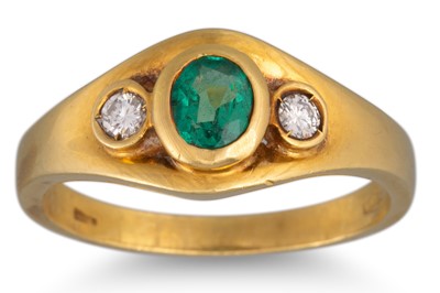 Lot 54 - A THREE STONE EMERALD AND DIAMOND RING,...