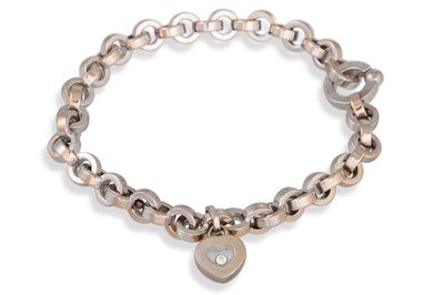 Lot 108 - A CHOPARD 'HAPPY DIAMOND' BRACELET, the heavy...