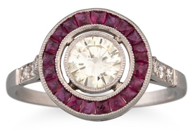 Lot 116 - A DIAMOND AND RUBY TARGET RING, the old cut...