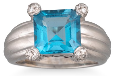 Lot 117 - A TOPAZ AND DIAMOND RING, mounted in platinum,...