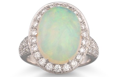 Lot 138 - AN OPAL AND DIAMOND CLUSTER RING, the oval...