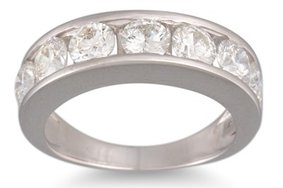 Lot 139 - A DIAMOND HALF ETERNITY RING, the brilliant...