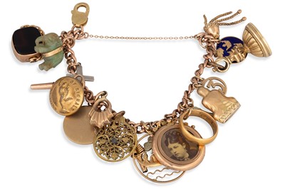 Lot 220 - A VINTAGE CHARM BRACELET, the rose gold curb...