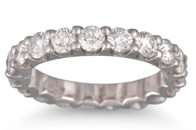 Lot 129 - A DIAMOND FULL BANDED ETERNITY RING, mounted...