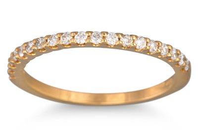 Lot 130 - A DIAMOND HALF ETERNITY RING, the brilliant...