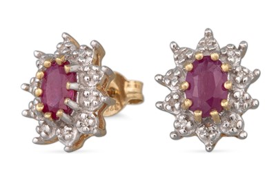 Lot 64 - A PAIR OF DIAMOND AND RUBY CLUSTER EARRINGS,...