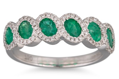 Lot 66 - AN EMERALD AND DIAMOND RING, comprising six...