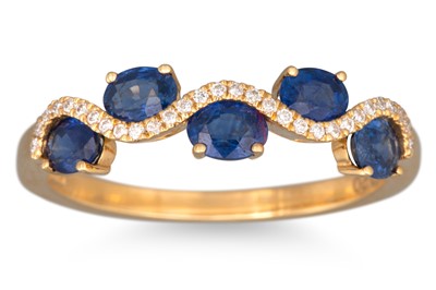 Lot 155 - A DIAMOND AND SAPPHIRE RING, five oval...