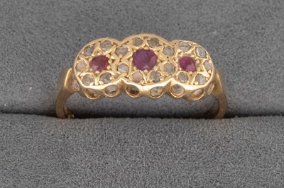 Lot 6 - A RUBY AND DIAMOND RING, mounted in 18ct...