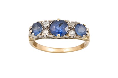 Lot 217 - A VINTAGE SAPPHIRE AND DIAMOND RING, the...