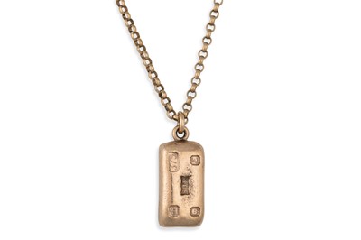 Lot 283 - A 9CT GOLD INGOT, on a 9ct gold chain, 41 g.