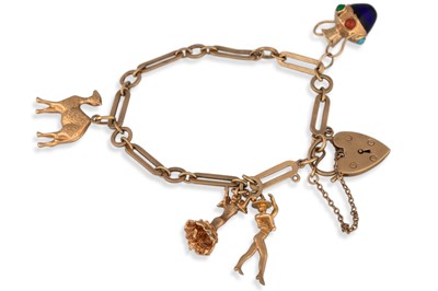 Lot 286 - A 9CT GOLD CHARM BRACELET, padlock clasp, 17 g.