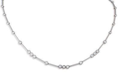 Lot 243 - A DIAMOND SET NECKLACE, the round brilliant...