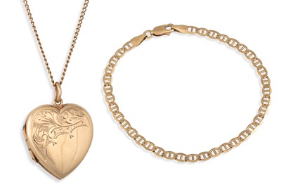 Lot 101 - A 9CT GOLD HEART SHAPED LOCKET, on a yellow...