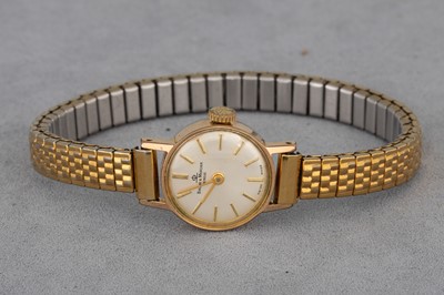 Lot 154 - A LADY'S BAUME-MERCIER GOLD-PLATED WRISTWATCH,...