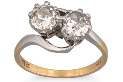 Lot 218 - A TWO STONE DIAMOND RING, the old cut diamonds...