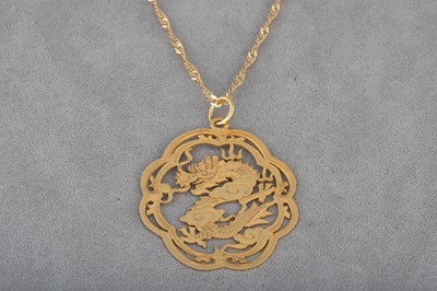 Lot 74 - A 14CT GOLD PENDANT, in the form of a dragon,...