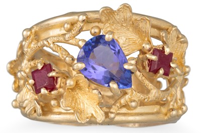 Lot 165 - A TANZANITE AND RUBY RING, set with a pear...