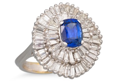 Lot 168 - A SAPPHIRE AND DIAMOND CLUSTER RING, the oval...