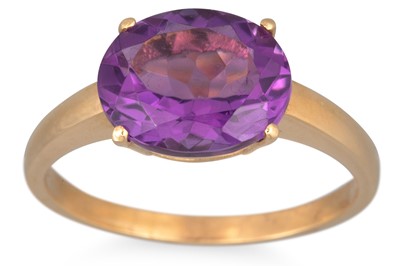 Lot 171 - AN AMETHYST RING, the oval amethyst mounted in...