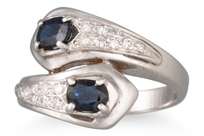 Lot 172 - A SAPPHIRE AND DIAMOND RING, of cross over...