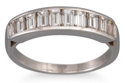 Lot 173 - A DIAMOND HALF ETERNITY RING, the baguette cut...